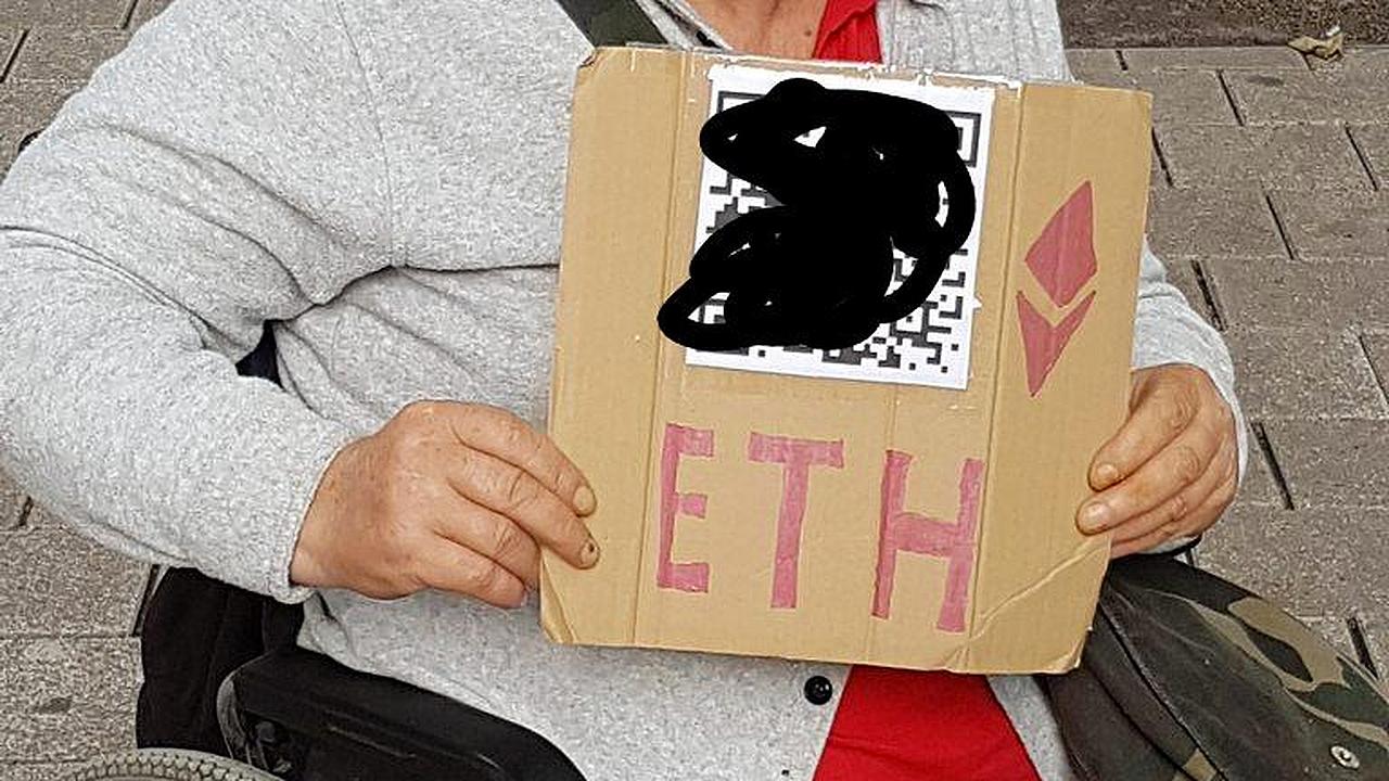 Бомж из Кельна принимает подаяние в криптовалюте